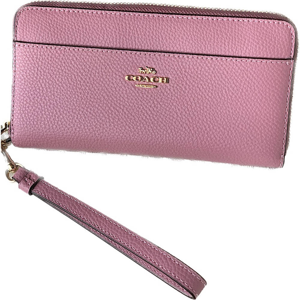 Light pink Coach accordion wallet.